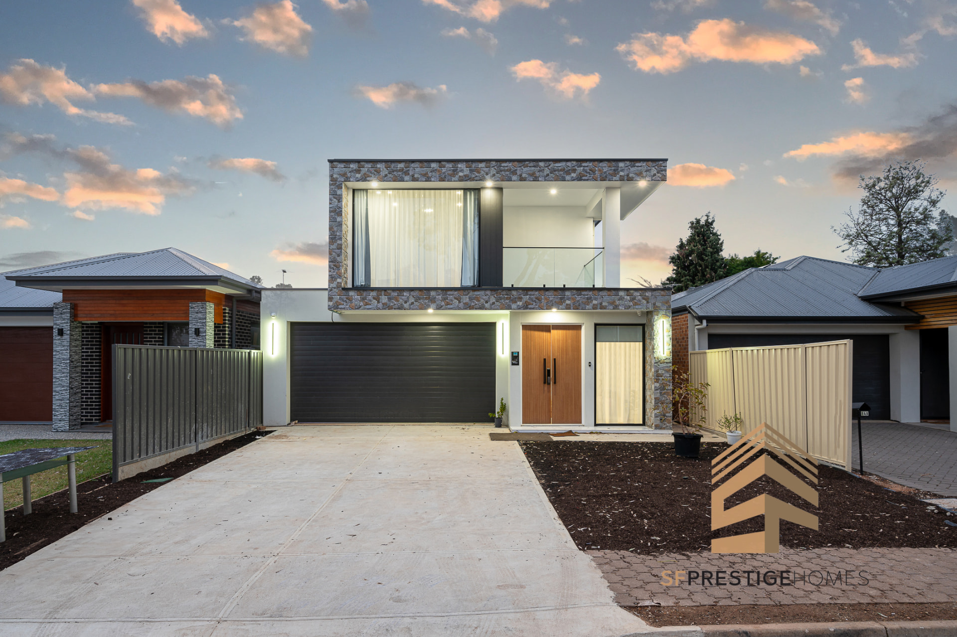 SF Prestige Homes double storey home at Wright Rd photographed at dusk